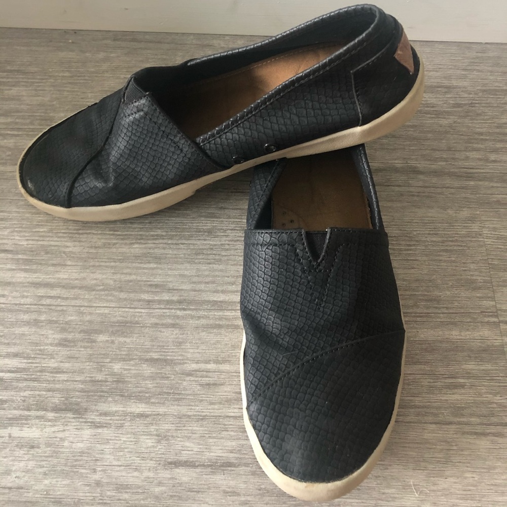 Black slip on sneakers